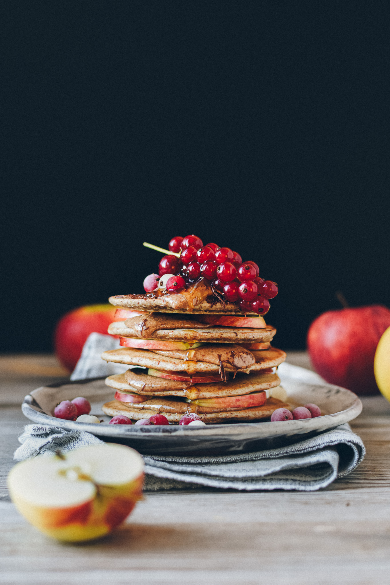Pankake stack with currants and apples
