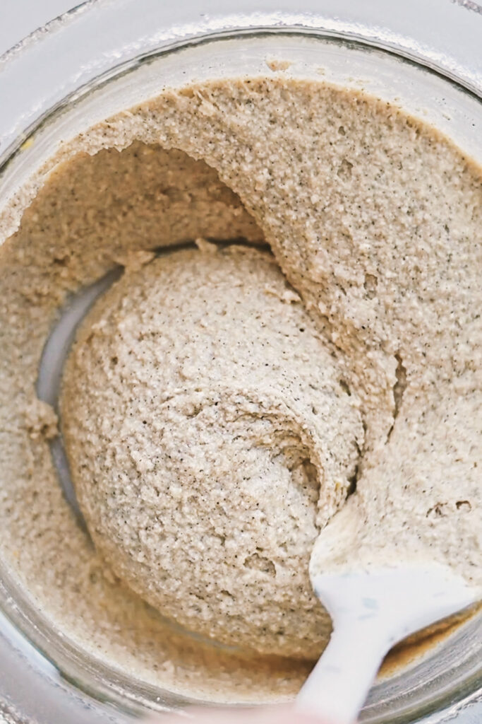 Creamy corn dough mixed with a spatula