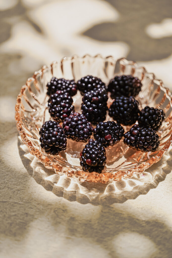 Blackberries in a vintage glass bowl