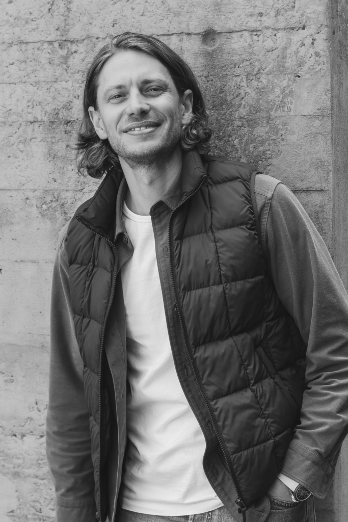 Dario portrait b&w concrete wall